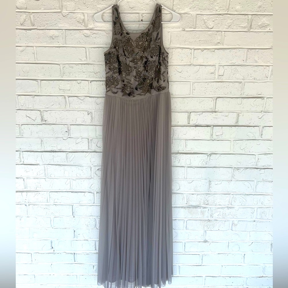 Grey beaded bodice accordion pleated gown